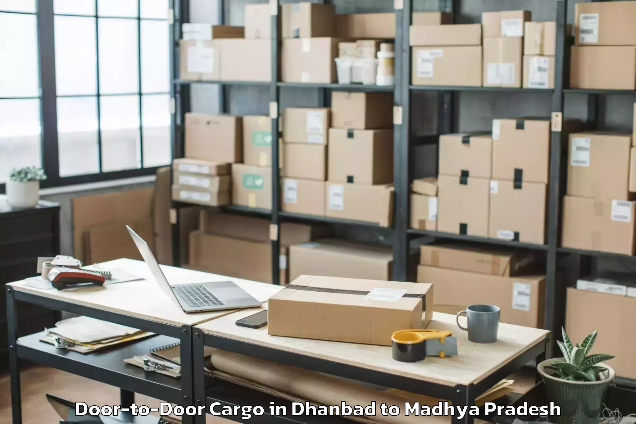 Quality Dhanbad to Guna Airport Gux Door To Door Cargo